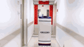 机器人配合自动门来往输液配置区和病房之间送药 机器人配合自动门来往输液配置区和病房之间送药