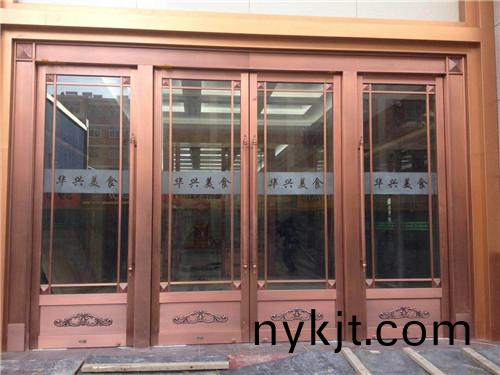 甘肃西峰华兴食府铜地弹门案例 甘肃西峰华兴食府铜地弹门案例