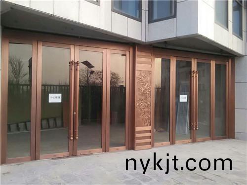 木纹玻璃铜门