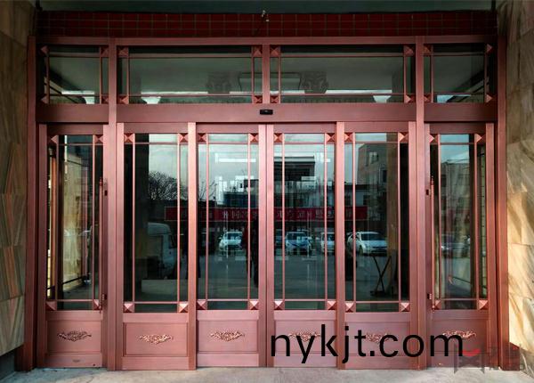 地产四开玻璃铜门