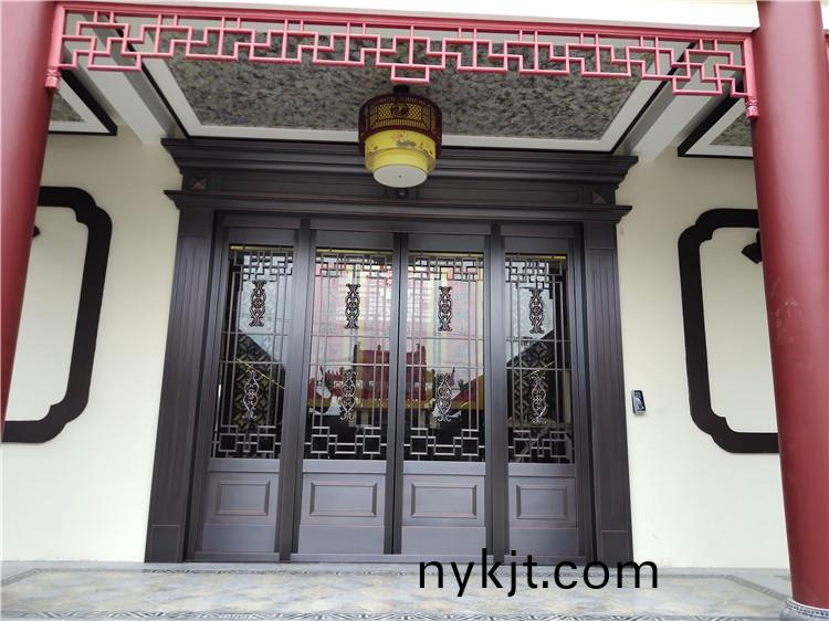 一楼前大门——纯铜自动平开门采用多玛平开门机 一楼前大门——纯铜自动平开门采用多玛平开门机